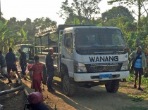 Village truck serving as a connection with Madang town, its markets and shops.