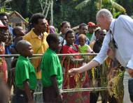 Bill Rothery, the CEO of Swire and Sons Australia, visiting the school sponsored by his company.