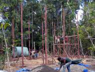 Construction site in the rainforest - erecting the first building.