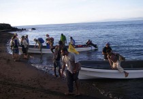 Landing on a volcanic beach of the Manam Island.