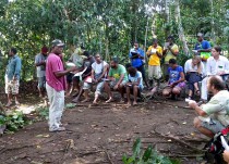 Kipiro Damas giving his traditional lecture on plant identification by sight, touch, smell, taste and sound.